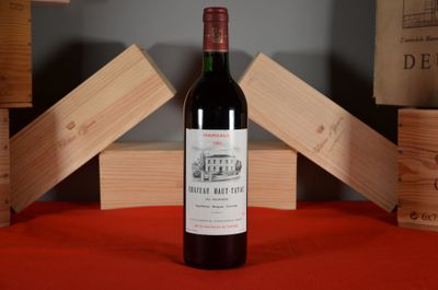 a bottle of wine that is sitting on a table