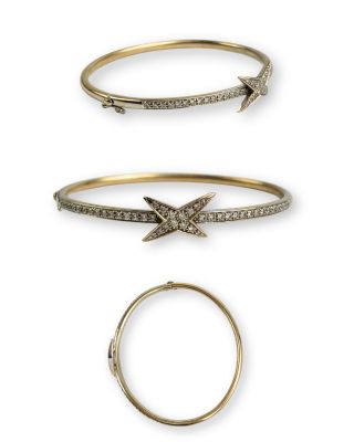 un lot de trois bracelets rigides en or et diamants