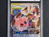 a close up of a pokemon card in a plastic case