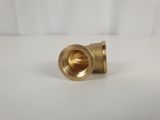 an image of a brass plated brass fitting on a white background