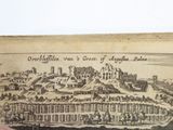 someone is holding a piece of paper with a drawing of a castle on it