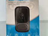 packaging of a smart visual doorbell in a box on a table