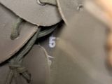 a close up view of a helmet with a number on it