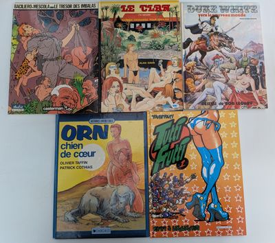 beaucoup de bandes dessinées posées sur une table blanche