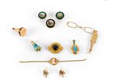 a group of jewelry including a broochle, earrings, and a pin