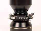 nikkor - am e d lens mounted on a white background