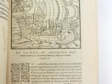 an open book with a picture of a ship on it