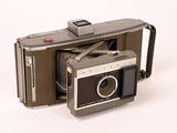 an old photo of an old camera on a white background