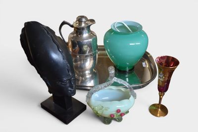 many different vases and vases on a tray