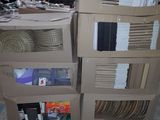 boxes stacked on top of each other on a pallet in a warehouse
