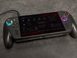 a tablet with a game controller on top of it