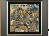 an image of a painting on a wooden easel with a black frame