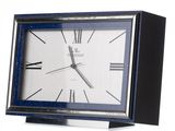 a clock that is sitting on top of a table