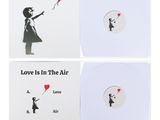 « Il y a quelqu'un dans l'air, l'amour est dans l'air » – vinyle blanc