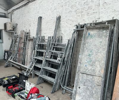 a room filled with lots of different types of construction equipment