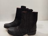 the boots are black and have red trims on them