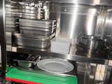 an image of a kitchen with a stove and pots and pans
