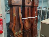 a lot of clocks that are on display in a store