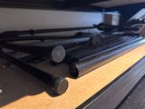 a bunch of metal rods sitting on top of a table