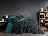 an image of a bedroom scene with a bed and a bookcase