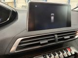 a picture of a car dashboard with a remote control in it