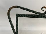 an image of a mirror with a chain hanging from it ' s sides