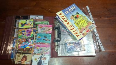 a lot of children ' s books on a wooden table