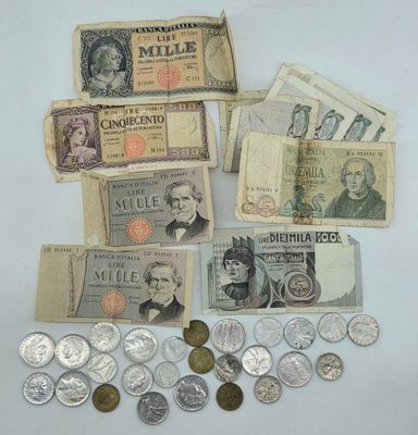 many different types of money and coins on the table