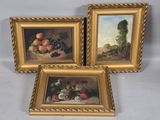 three framed paintings of fruit and flowers on a table