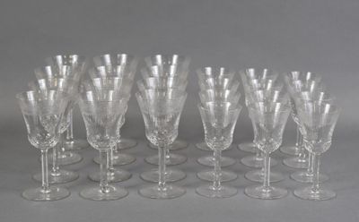 a lot of empty wine glasses sitting on a table
