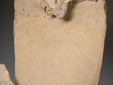 three pieces of stone sitting next to each other on a table