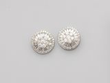 a pair of diamond and white gold earrings