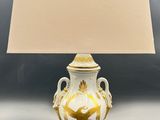 a lamp that is sitting on a table with a lamp on it