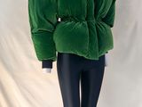 green velvet jacket on mannequin base with black leggings