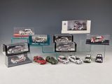 a lot of toy cars that are in a display case
