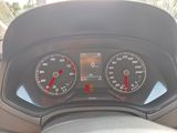 a close up of a car dashboard with a speedometer and gauges
