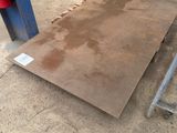 a piece of metal that is sitting on the ground
