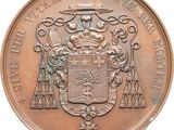 an old coin with a coat of arms and a crown on it