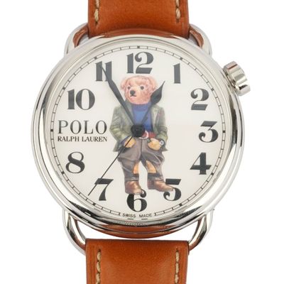 a close up of a wrist watch with a polo bear on it