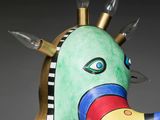 an image of a colorful sculpture of a bird with spikes on it ' s head
