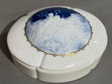 a white box with a blue and white design on it
