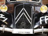 a black car with a sign on the front of it