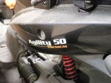 a close up of a motorcycle that is parked on the street