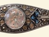 an image of a close up of a ring with a stone in it