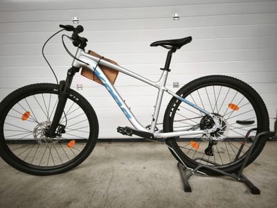 a bike that is parked in front of a garage door