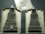 two pieces of metal that have been cut in half