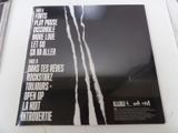 the album cover of the album is black and white, with a black and white image of a pair of
