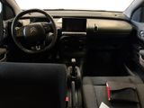 a picture of a car dashboard with a steering wheel