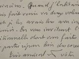 une vieille lettre manuscrite écrite à l'encre noire sur un morceau de papier
