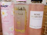 many different types of perfume bottles on a table